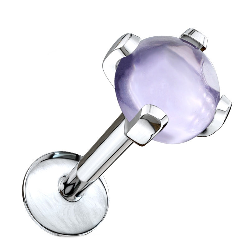 An amethyst stone labret earring pictured diagonally against a white background.