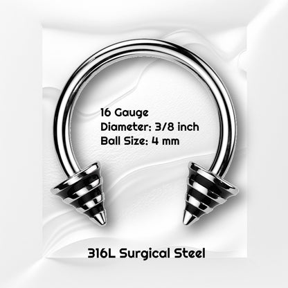 A black stripe horseshoe barbell featuring spikes with black stripes on the ends of the circular barbell pictured against white wavy background with black text stating the size available of this horseshoe earring.