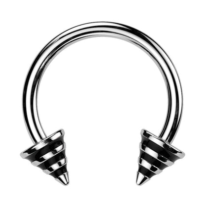 A black stripe horseshoe barbell featuring spikes with black stripes on the ends of the circular barbell pictured against a white background.