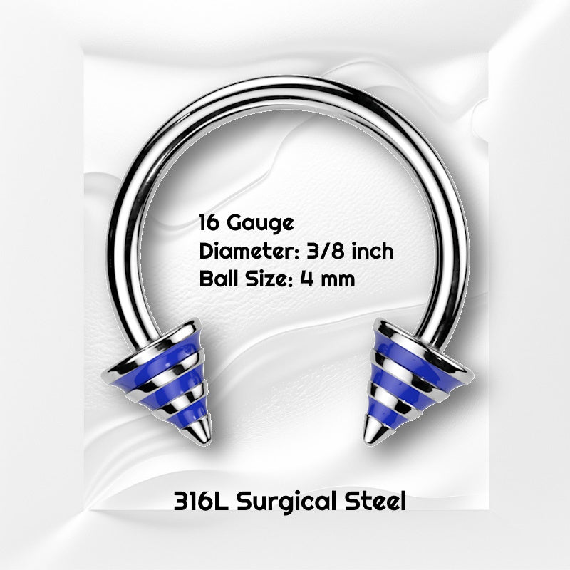 A blue stripe horseshoe barbell featuring spikes with blue stripes on the ends of the circular barbell pictured against white wavy background with black text stating the size available of this horseshoe earring.