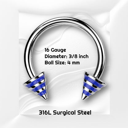 A blue stripe horseshoe barbell featuring spikes with blue stripes on the ends of the circular barbell pictured against white wavy background with black text stating the size available of this horseshoe earring.