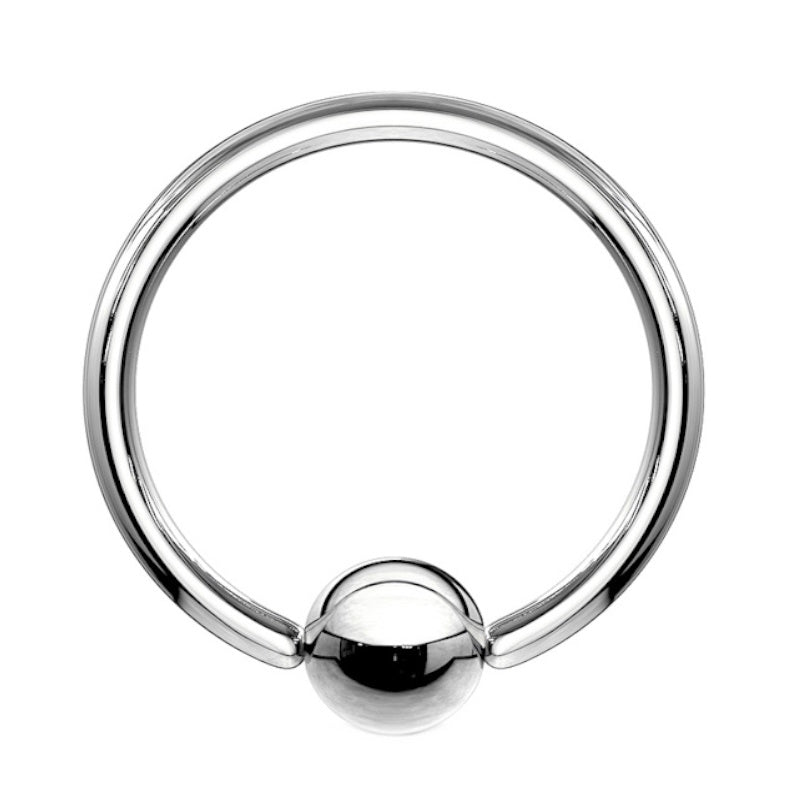 A surgical steel captive bead ring earring pictured against a white background.