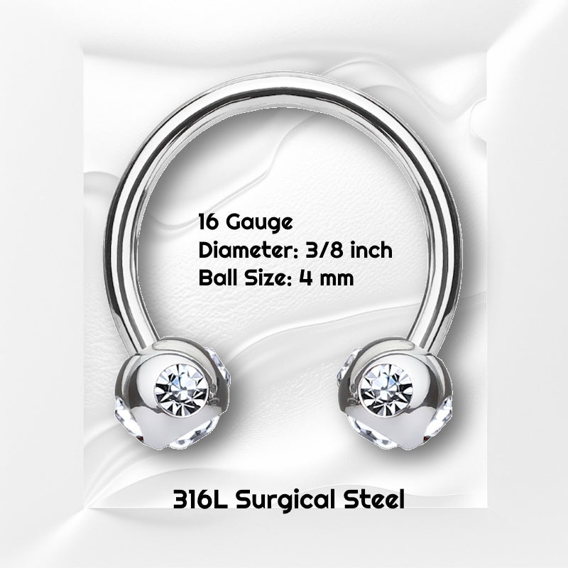 A clear gem horseshoe earring featuring 5 clear gams in each ball pictured against white wavy background with black text stating the size available of this circular barbell earring.