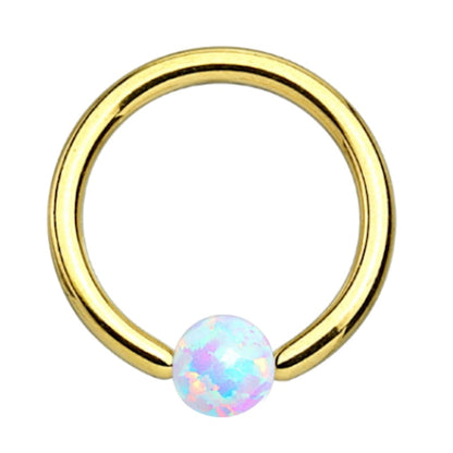 A gold plated opal earring pictured against a white background. 