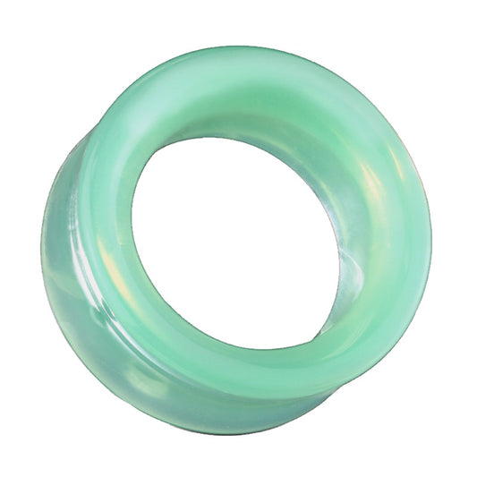 One of a pair of green opalite glass tunnels pictured against a white background.