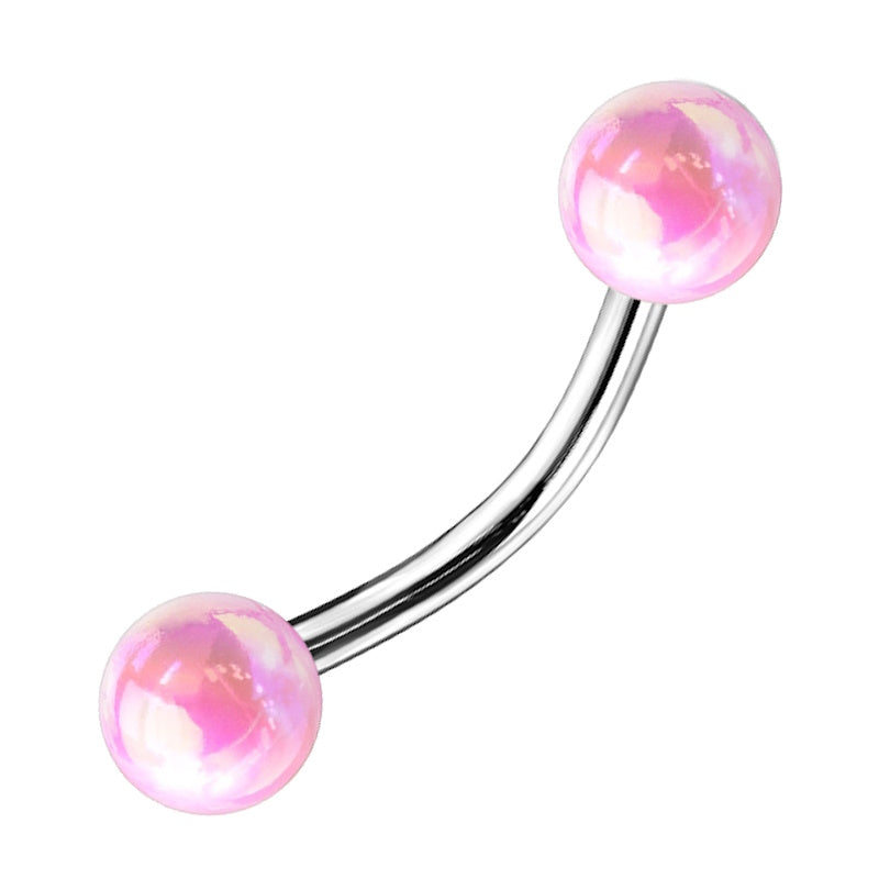 A pink balls curved barbell earring with blue metallic balls pictured against a white background.