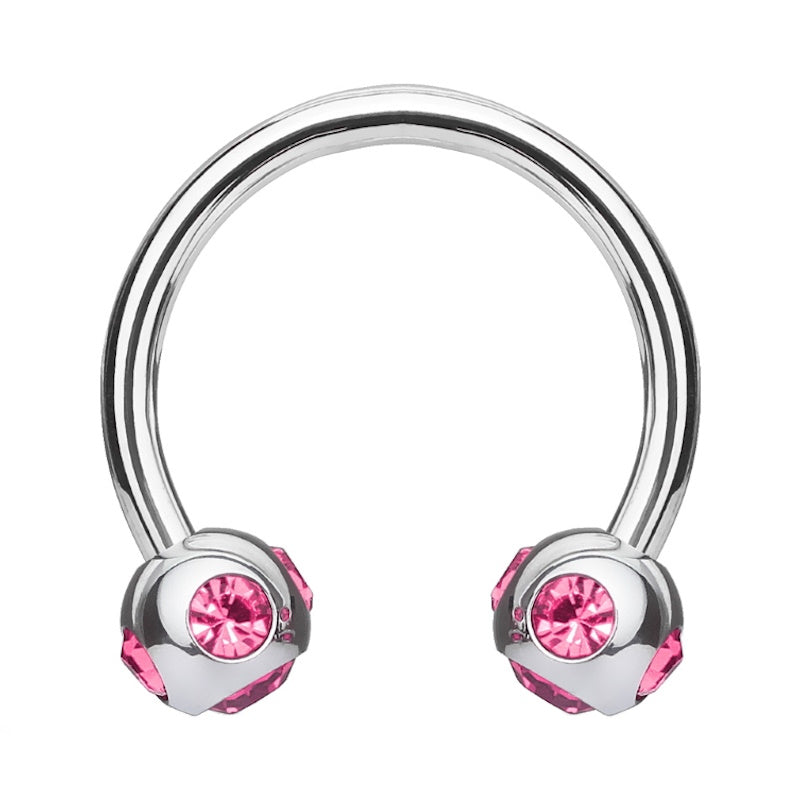 A pink gem horseshoe earring featuring 5 pink gems in each ball pictured against a white background.