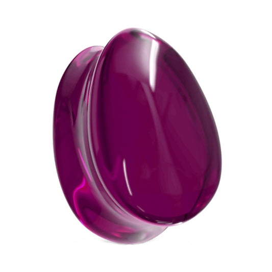 One of a pair of purple glass teardrop gauges pictured against a white background.