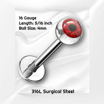 A red eyeball 16g labret earring pictured on a white wavy background with black text stating the size available of this labret.