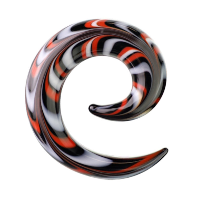 One of a pair of multicolor spiral glass taper earrings pictured against a white background.