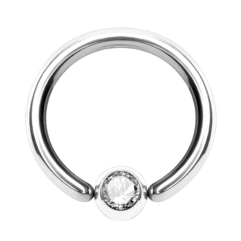 A surgical steel fixed bead ring pictured against a white background.