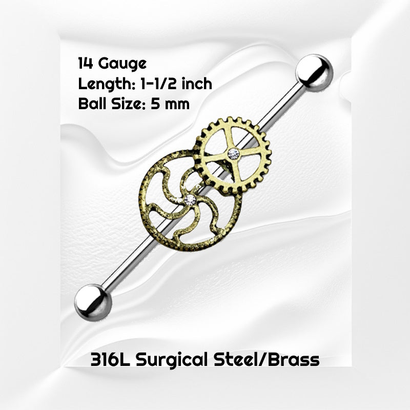 A surgical steel steampunk earring pictured against a white wavy background with black text stating the size available of this industrial barbell.