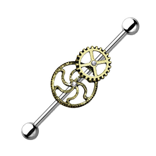 A surgical steel steampunk earring pictured against a white background.