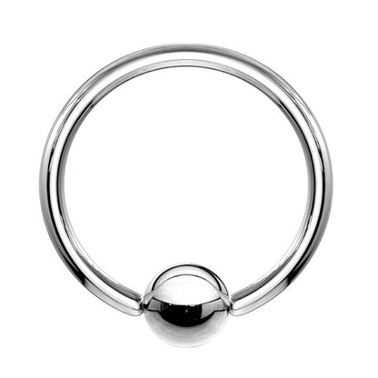 A titanium captive bead ring earring pictured against a white background.