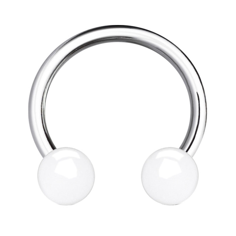 A white balls 16 gauge earring pictured against a white background. 